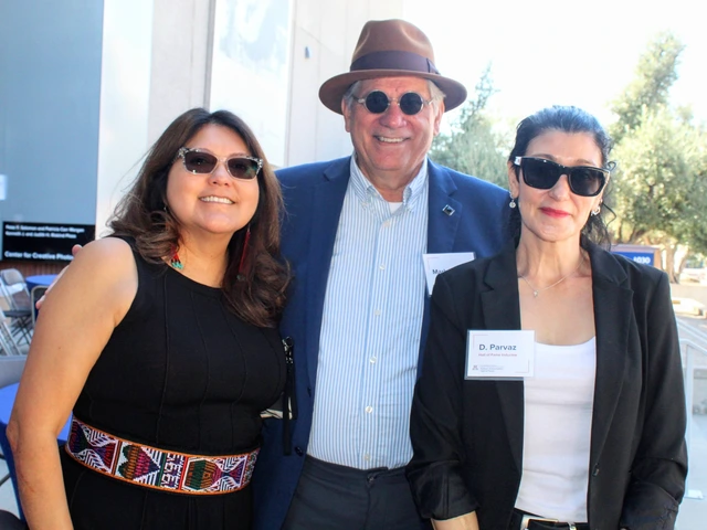Attendees pose for photo at event