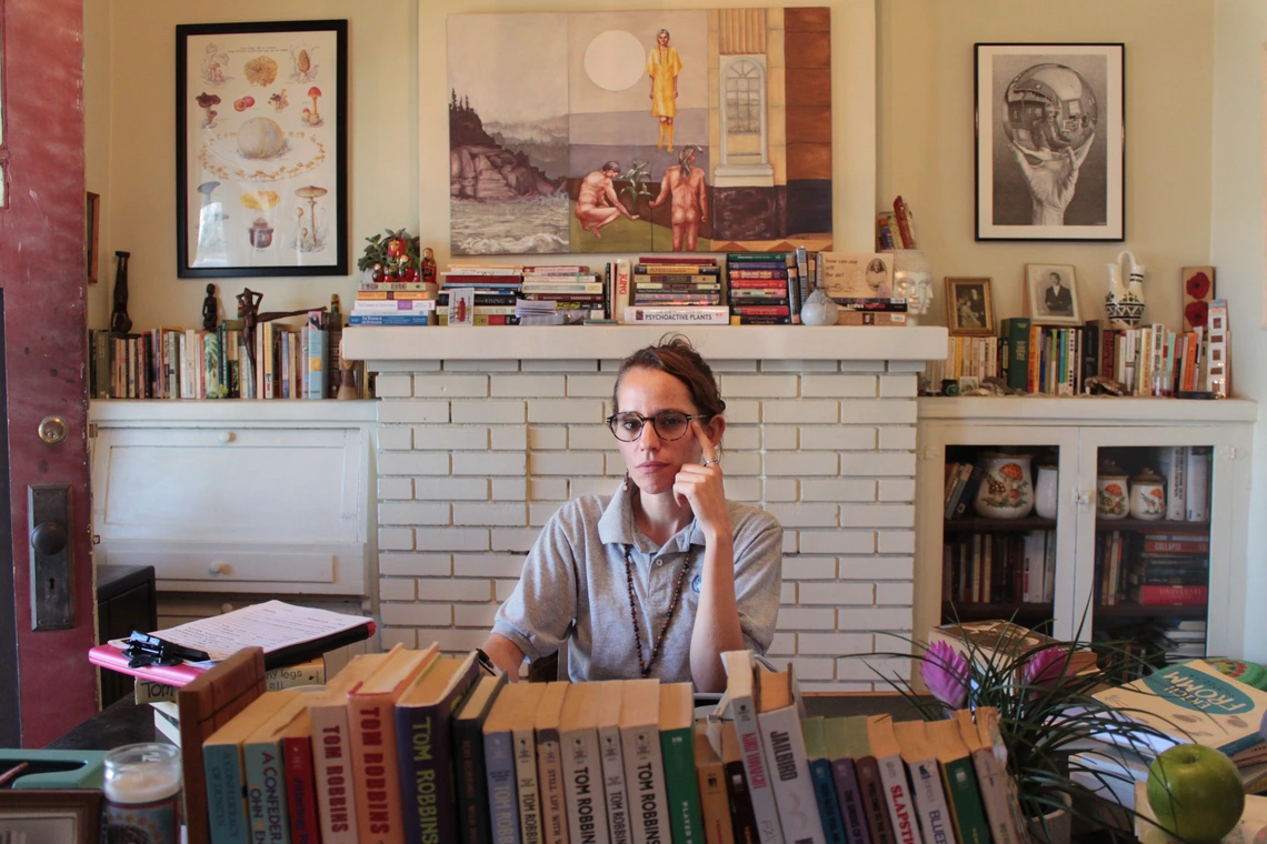 Woman surrounded by books
