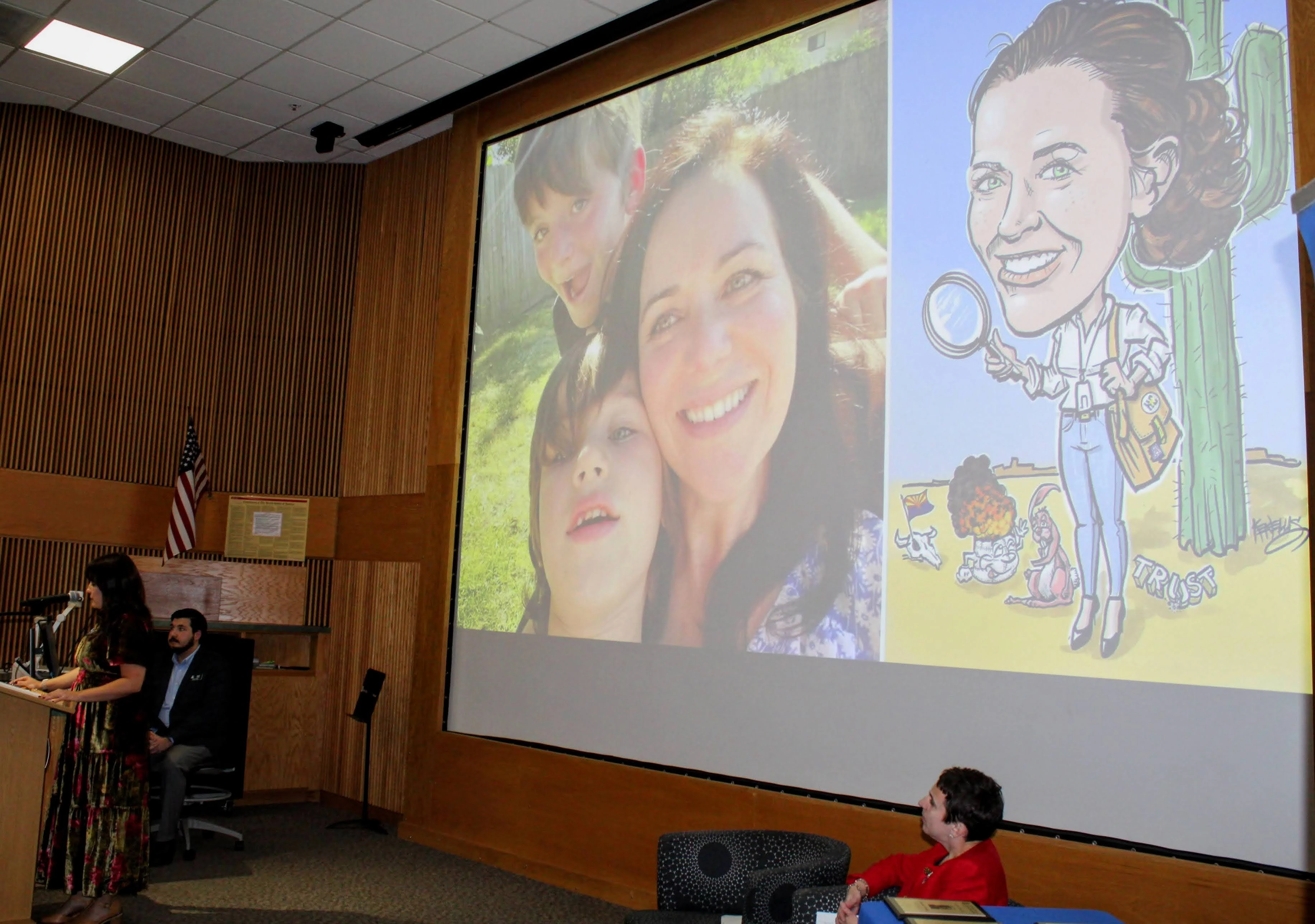 Photos of inductee shown on screen during event