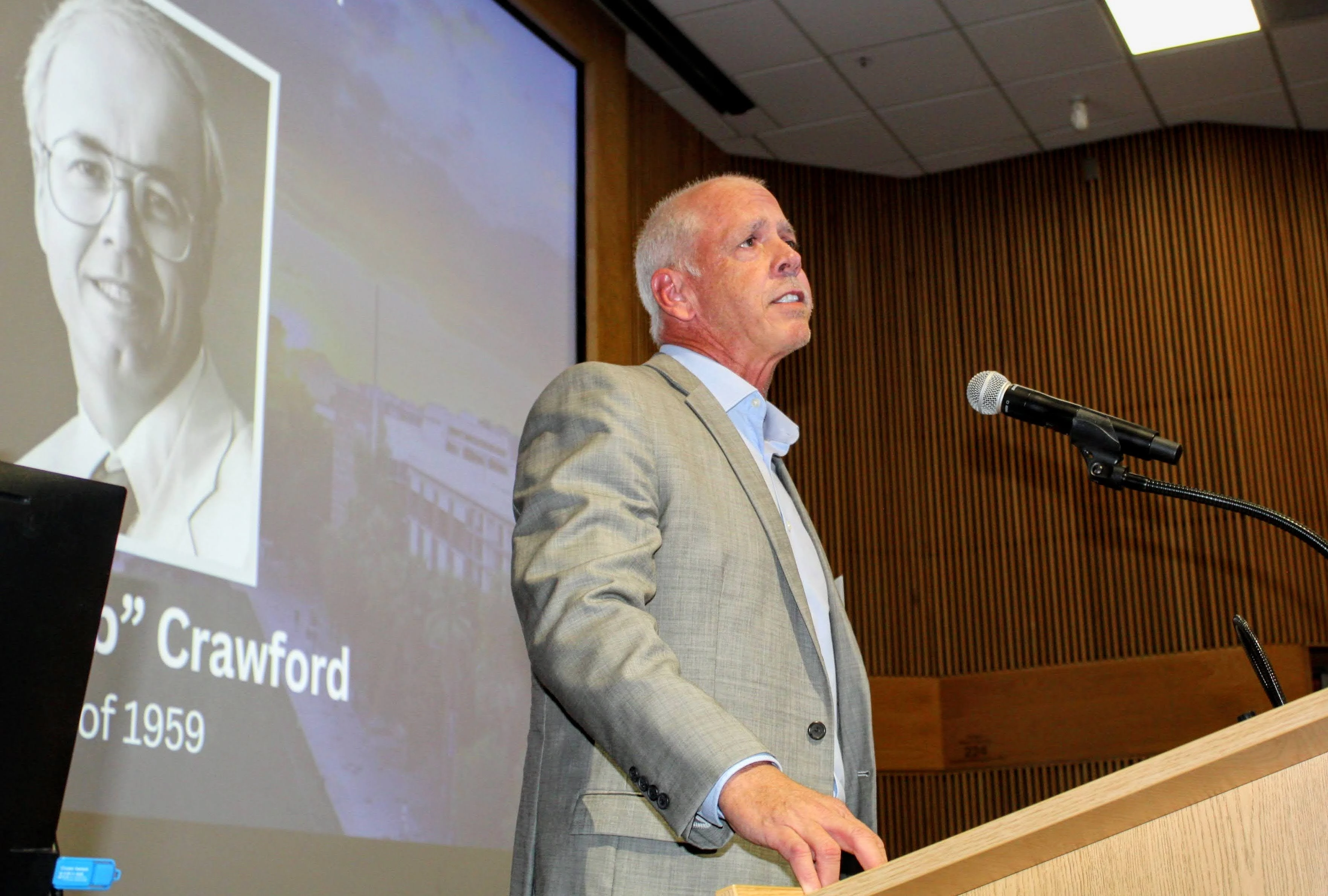 Inductee's relative gives acceptance remarks at podium