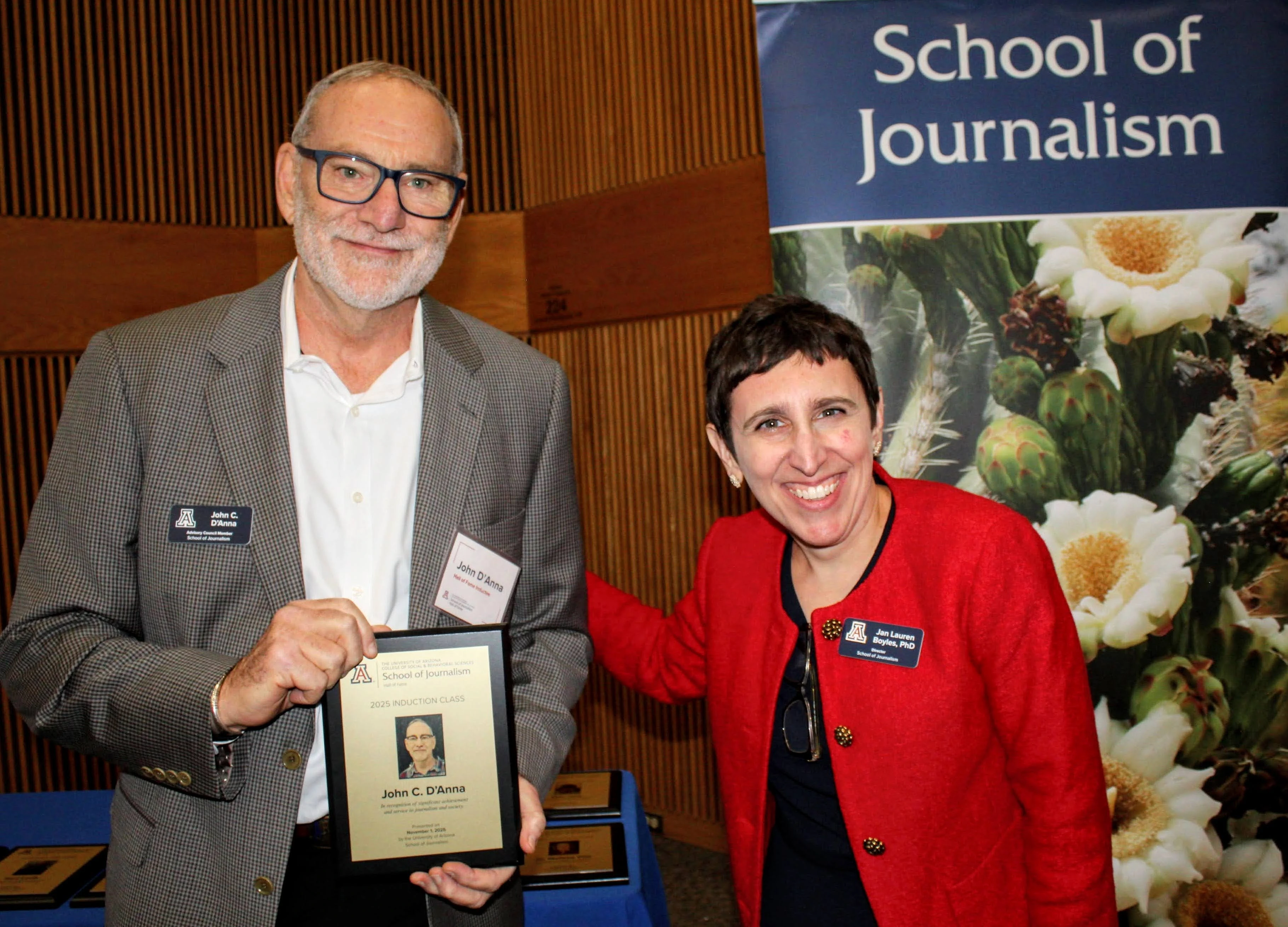 Inductee holds Hall of Fame plaque