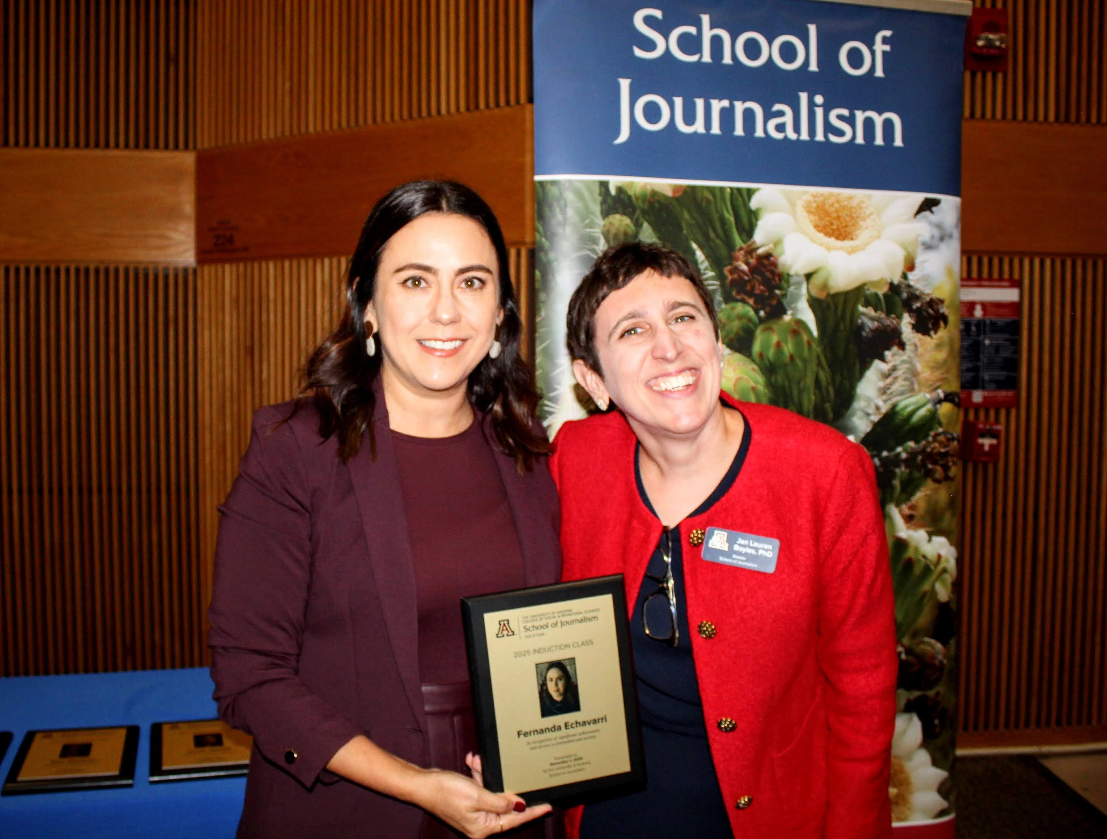 Inductee holds Hall of Fame plaque