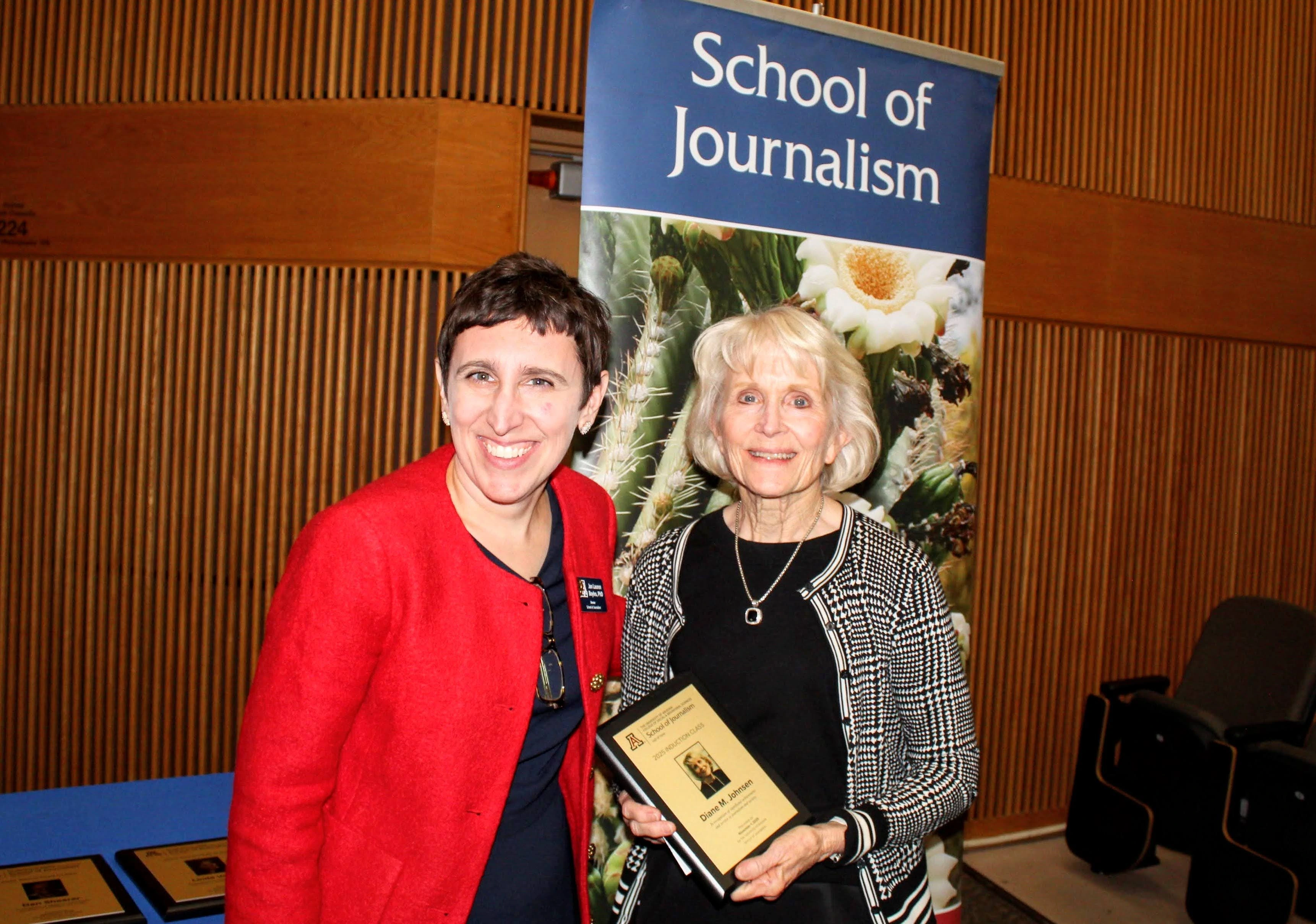 Inductee holds Hall of Fame plaque