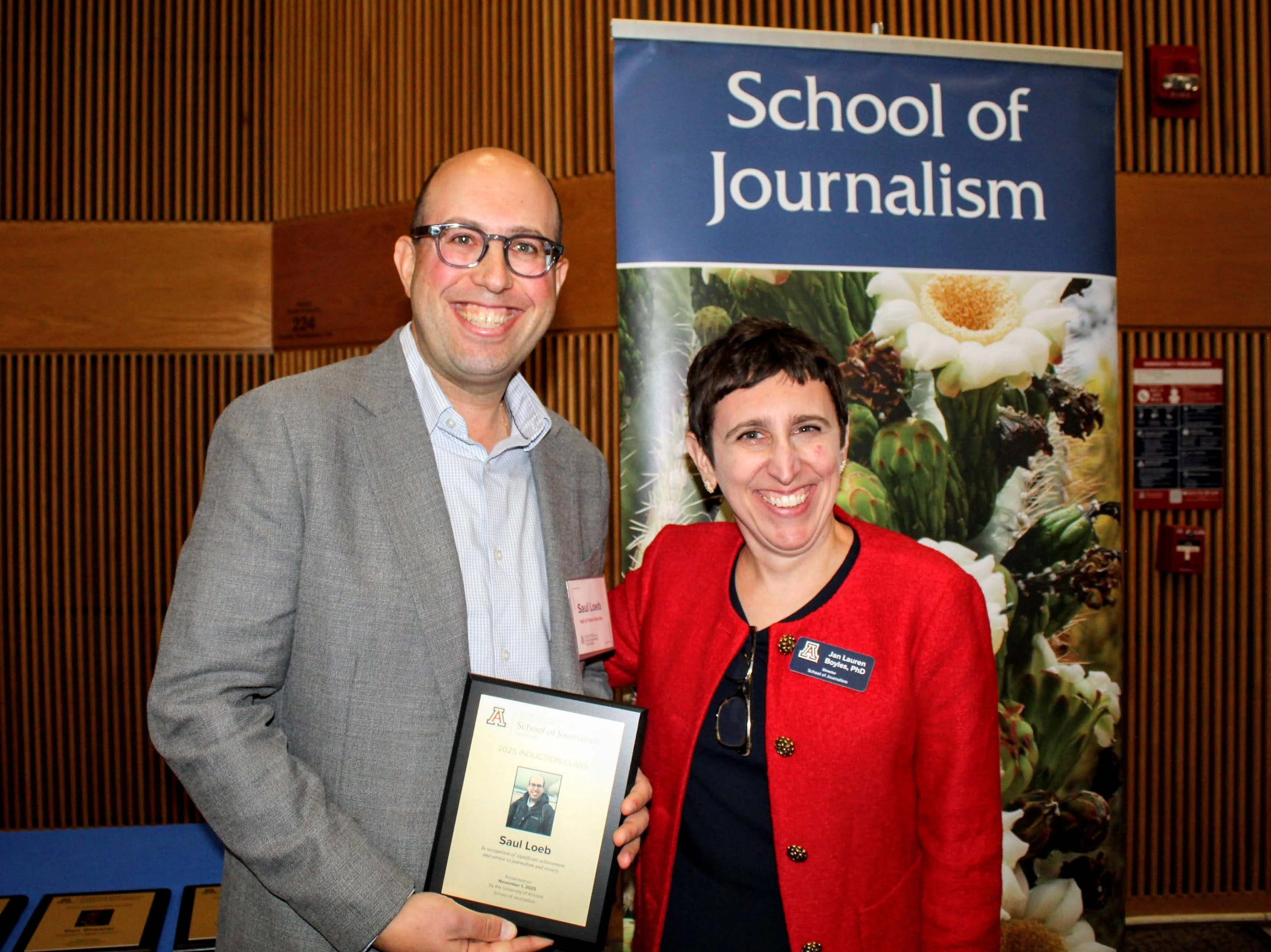 Inductee holds Hall of Fame plaque