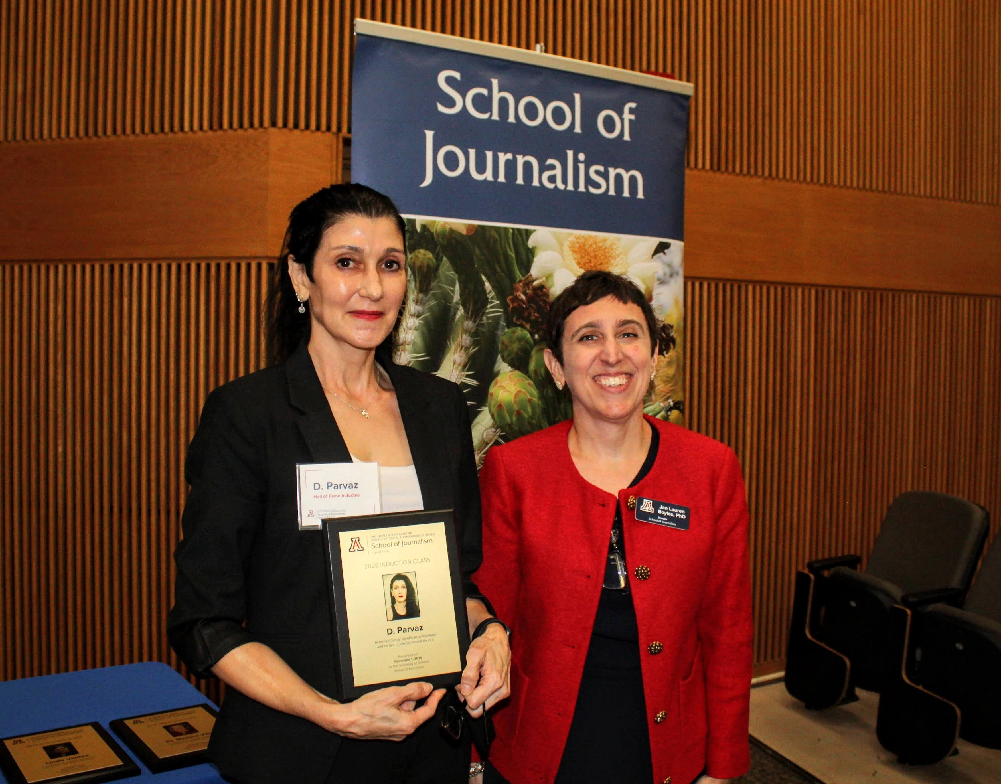 Inductee holds Hall of Fame plaque