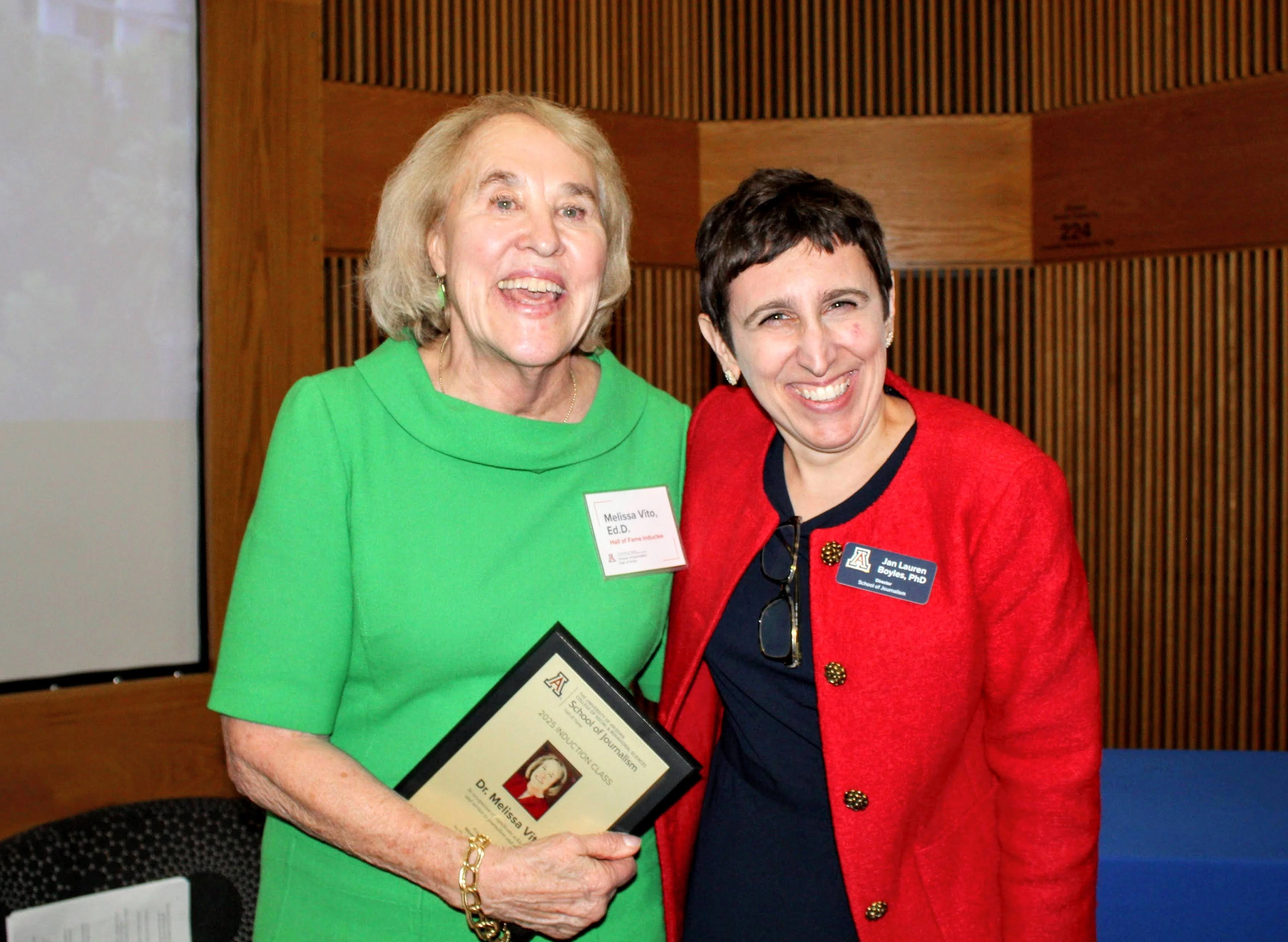 Inductee holds Hall of Fame plaque