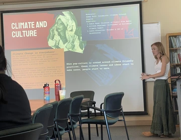 A student presents in a classroom