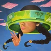A painting depicts a woman with virtual headset on in front of a desert landscape