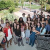 A group of students stand in the stairwell of the student union