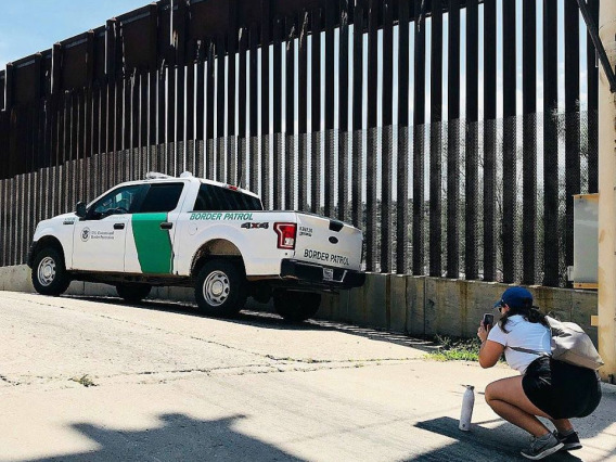 Student photographs a Border Patrol truck