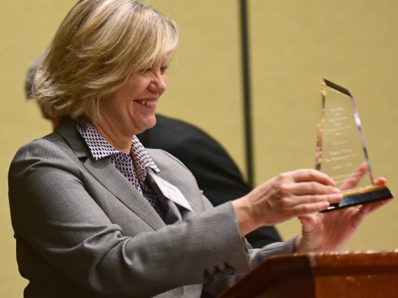 Dana Priest accepts the school's 2016 Zenger Award