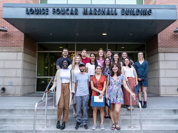 A group of students standing in front of the Marshall Building