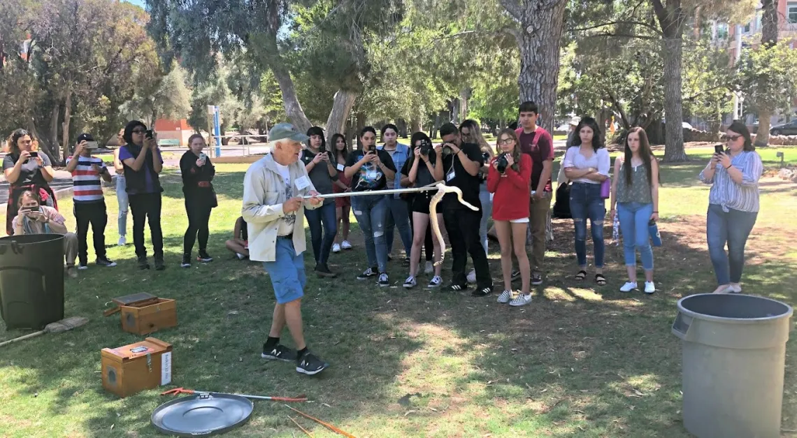 Cecil Schwalbe handles a rattlesnake