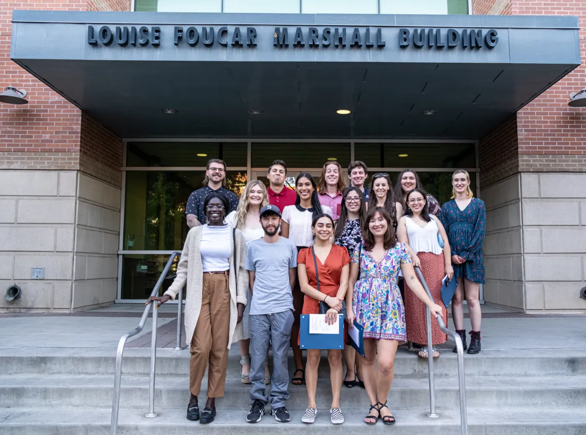 A group of students standing in front of the Marshall Building